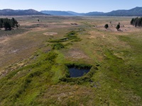 A drone view of the Upper Feather River restoration projects in the Northern Sierra are operated and managed by California Department of Water Resources’s (DWR) Northern Region Office (NRO) and the State Water Project (SWP). Thompson Meadow restoration has been completed with ongoing monitoring to ensure the natural habitat continues to enhance water supply for the SWP while benefitting wildlife and reducing wildfire risk in local communities. Photo taken July 8, 2025.