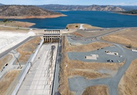 A drone view of workers performing maintenance on the spillway of the Oroville Dam located at Lake Oroville in Butte County, California. Photo taken October 2, 2023.