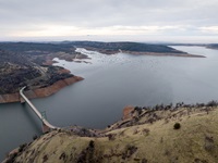 A drone view of water levels at Bidwell Bar Bridge and (Left) Bidwell Canyon Marina at Lake Oroville in Butte County, California.