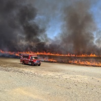 CAL FIRE crews monitor a control burn near the Thermalito Forebay in Oroville.