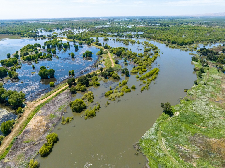 High river flows on the San Joaquin River at the San Joaquin River National Wildlife Refuge in Stanislaus County, California. Photo taken June 13, 2023.