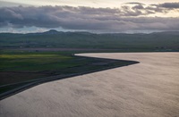 A drone view at dusk shows Clifton Court Forebay, which is managed by the California Department of Water Resources, at the southwestern edge of the Sacramento-San Joaquin Delta in Contra Costa County. Photo taken March 3, 2025.