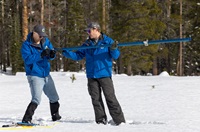 California Department of Water Resources Engineer Jacob Kollen (left) and Engineer Anthony Burdock conduct the first media snow survey of the 2026 season at Phillips Station in the Sierra Nevada. The snow survey is held approximately 90 miles east of Sacramento off Highway 50 in El Dorado County. Photo taken December 30, 2026.