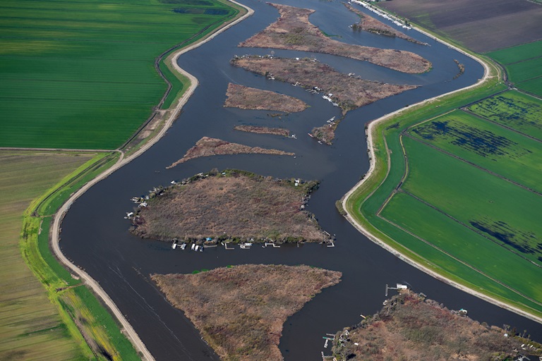 Aerial view looking east White Slough center, left is Rindge Tract and right is King Island, all part of the Sacramento-San Joaquin River Delta in San Joaquin County, California.