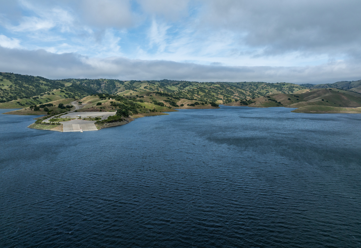 An aerial view from a drone shows Dinosaur Point Boat Launch Ramp and high lake levels at San Luis Reservoir in Merced County, California. Photo taken April 15, 2025.
