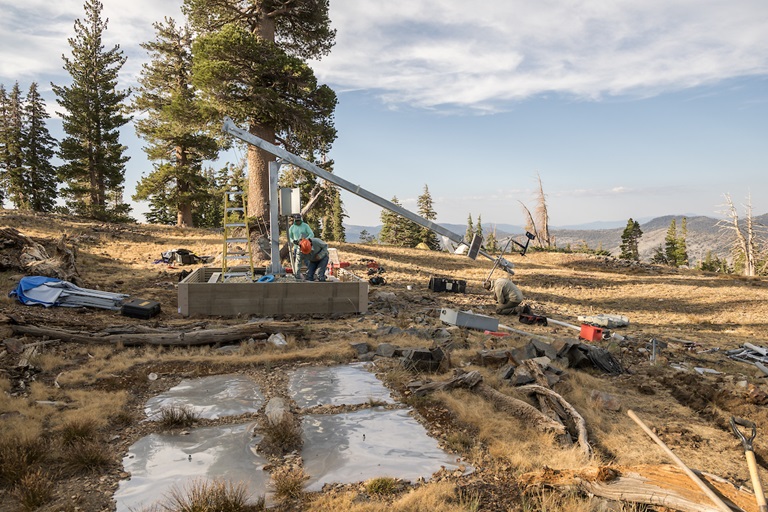 DWR Division of Flood Operations team renovate an existing snow pillow station, Lake Lois, with a new Hinge Fold Tilt-Pole within Desolation Wilderness, part of the Eldorado National Forest, on September 17, 2025.