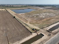 Temporary diversion equipment provided by DWR is deployed by Fresno Irrigation District to divert excess water from Kings River to reduce flood risk and expand groundwater recharge. Photo taken April 27, 2023