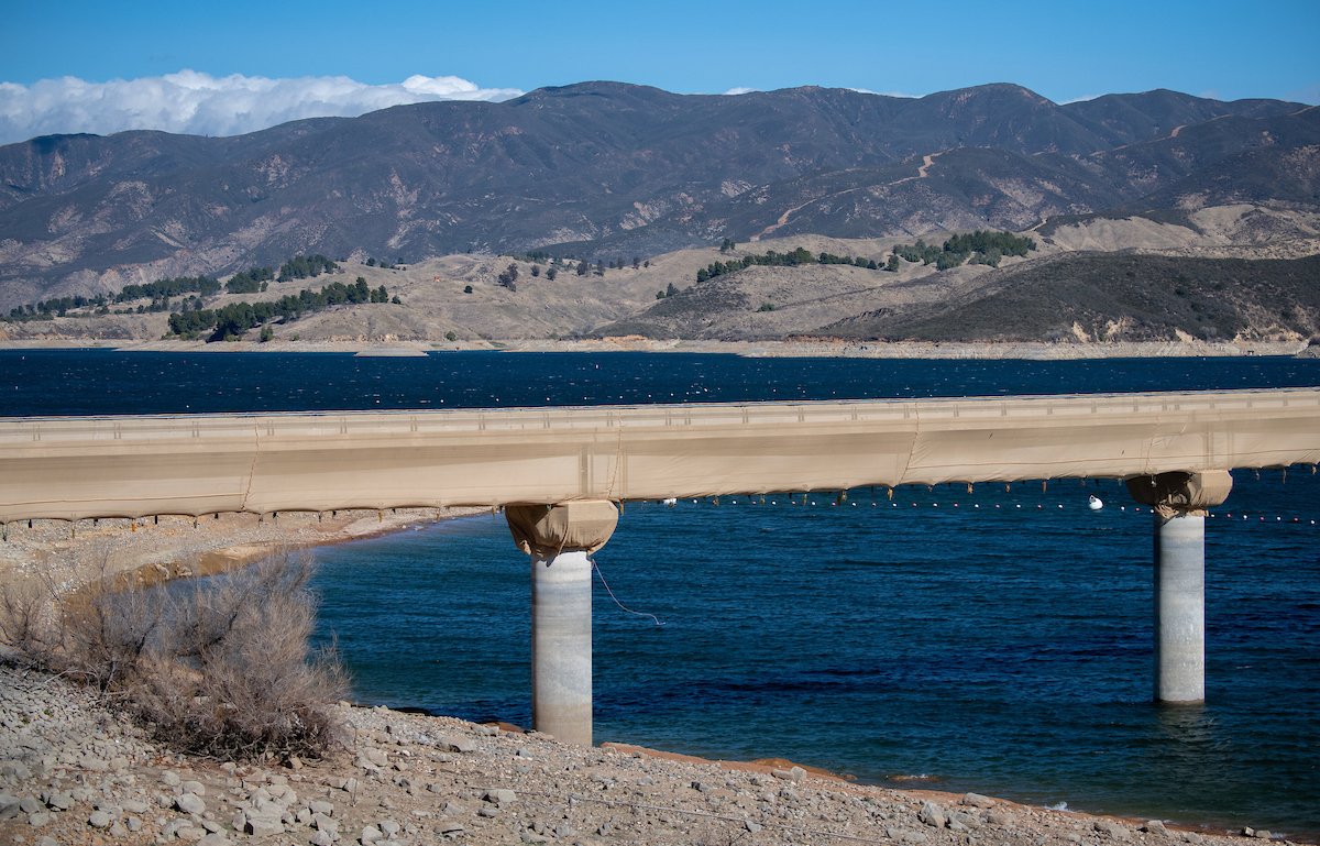 Bird netting covers a bridge to allow for seismic retrofit work at Castaic Lake in Los Angeles County