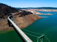 An aerial drone view at Bidwell Bar Bridge showing Lake Oroville at an elevation of 659 feet, 27 percent of total capacity or 36 percent of average capacity for this time or year, on July 20, 2021 in Butte County, California.