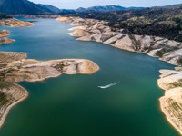 An aerial drone view showing low water near the Enterprise Bridge at Lake Oroville on March 17, 2022
