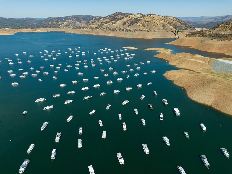 With visibly low water conditions shown in this aerial photograph taken via drone at Lake Oroville in Butte County, a section of shoreline and the Bidwell Canyon Marina are visible on a day when storage was  1,218,591 AF (Acre Feet) or 34% of total capacity