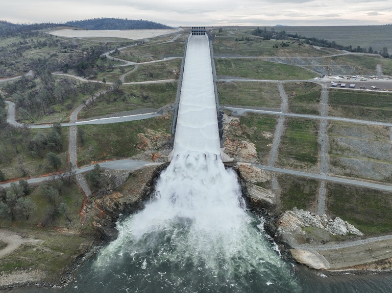 A drone provides an aerial view of the California Department of Water Resources first 2024 water release from the Lake Oroville flood control gates down the 3,000-foot main spillway in Butte County, California. Main spillway releases will continue to manage lake levels in anticipation of rain and snowmelt. Photo taken January 31, 2024.