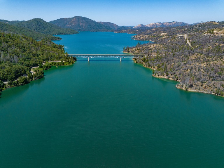 An aerial view shows high water conditions at Enterprise Bridge on Lake Oroville in Butte County, California. Photo taken July 3, 2023.