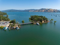 An aerial view shows high water conditions at the Bidwell Bar Bridge located at Lake Oroville in Butte County, California. Photo taken July 3, 2023.