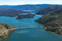 An aerial view shows high water conditions at the Bidwell Bar Bridge located at Lake Oroville in Butte County, California.