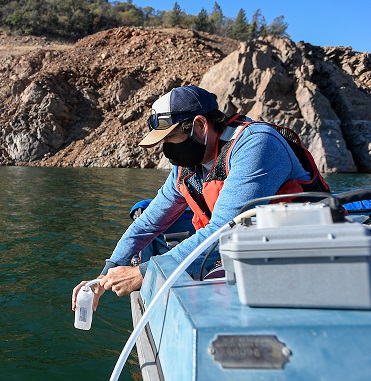 DWR water quality experts collect samples from Lake Oroville for testing.