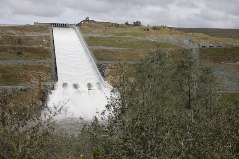 Water flows over the four energy dissipator blocks at the end of the Lake Oroville main spillway in Butte County, California. Photo taken March 10, 2023.