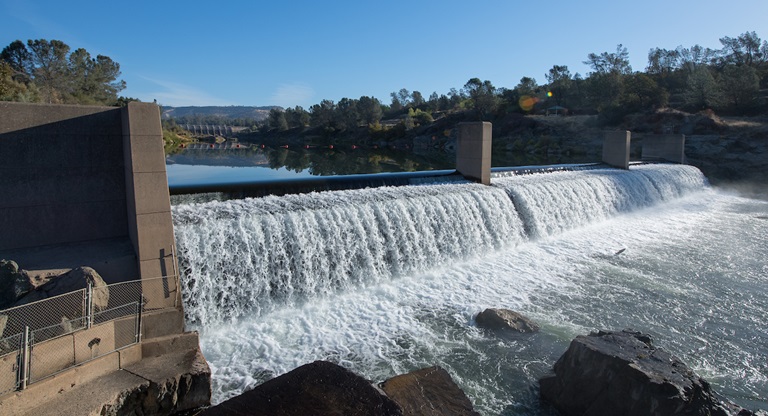 The Feather River Fish Barrier Dam forces fish to take the fish ladder on the left side at the Feather River Fish Hatchery in Oroville