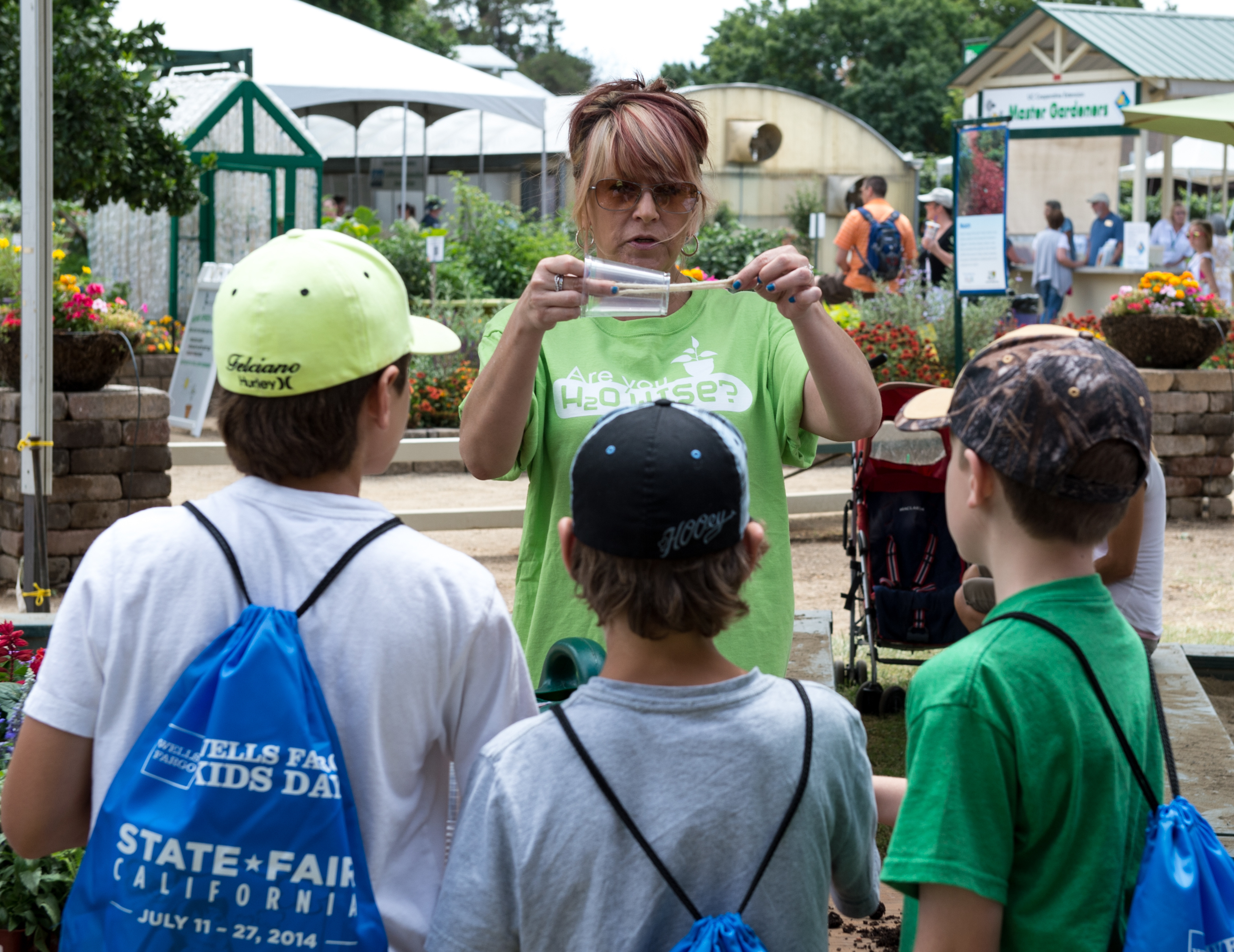 Volunteers educate youth on water conservation