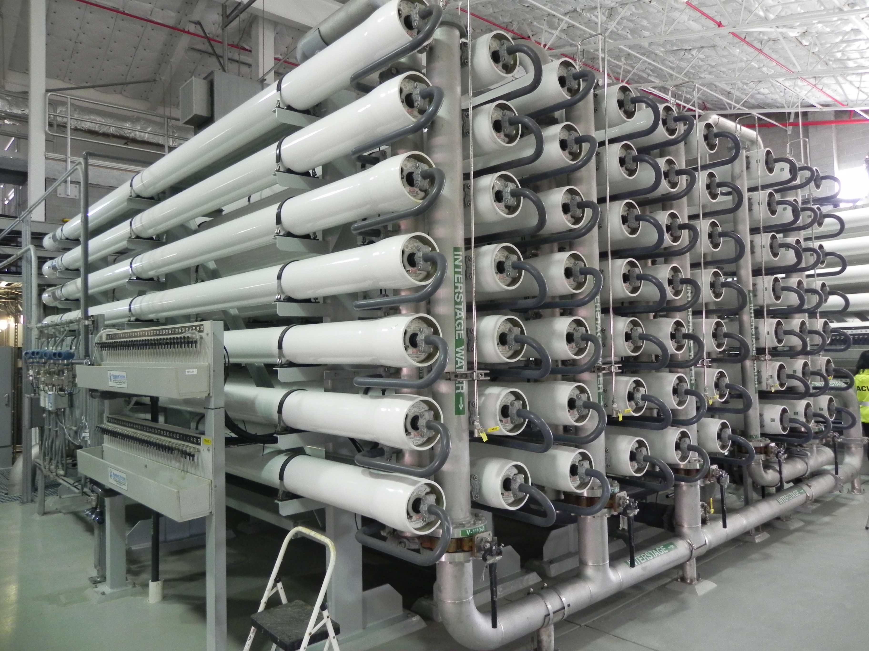 Photograph of a skid of reverse osmosis membranes installed at the Alameda County Water District  Newark Desalination Facility.  These membranes, installed in 2010, remove salts from brackish groundwater to provide high quality water to local customers.