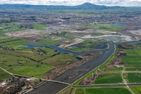 Aerial view looking south-west of the Dutch Slough Tidal Marsh Restoration Project the construction site, in the Sacramento-San Joaquin Delta near Oakley, California. Mt. Diablo can be seen in the background.