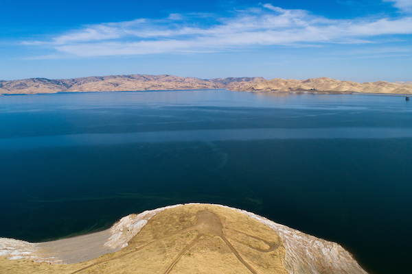 An aerial drone view of the San Luis Reservoir, located 12 miles west of the city of Los Banos near the historic Pacheco Pass, is part of the San Luis Joint-Use Complex, which serves the State Water Project and the federal Central Valley Project.