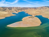 An aerial view of Dinosaur Point boat ramp at San Luis Reservoir. On this date, the reservoir storage is 931,706, 46 percent of total capacity. Photo taken May 25, 2022.