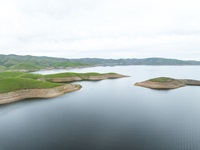 An drone view taken above Merced County, shows both a section of the Dinosaur Point Boat Launch Ramp and some of the San Luis Reservoir, about 12 miles west of the city of Los Banos in California. Photo taken February 16, 2024.