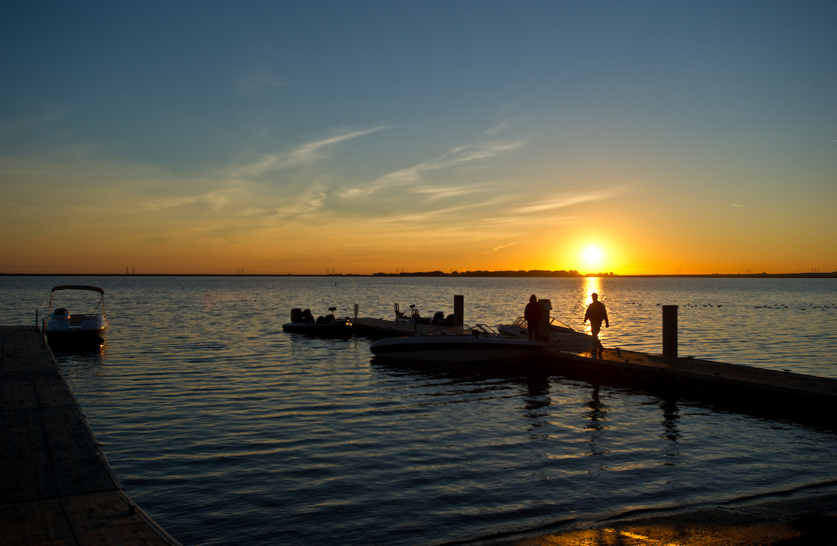 Individuals preparing for some early morning fishing on O'Neill Forebay in Merced County, California. 