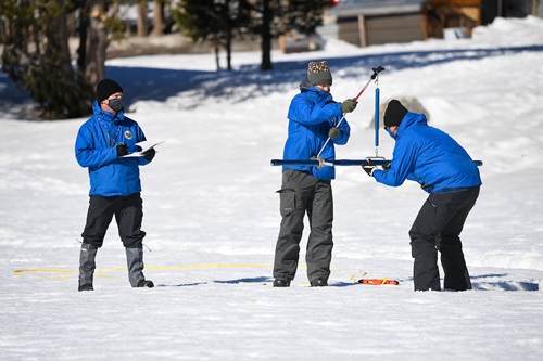 DWR staff conduct snow survey in the Sierra Nevada Mountains in February 2022.