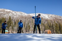 (Left to right) California Department of Water Resources staff Angelique Fabbiani-Leon, State Hydrometeorologist, Jordan Thoennes, Water Resources Engineer, and Andy Reising, Snow Surveys and Water Supply Forecasting Unit Manager, conduct the third media snow survey of the 2025 season at Phillips Station in the Sierra Nevada. The snow survey is held approximately 90 miles east of Sacramento off Highway 50 in El Dorado County. Photo taken February 28, 2025.