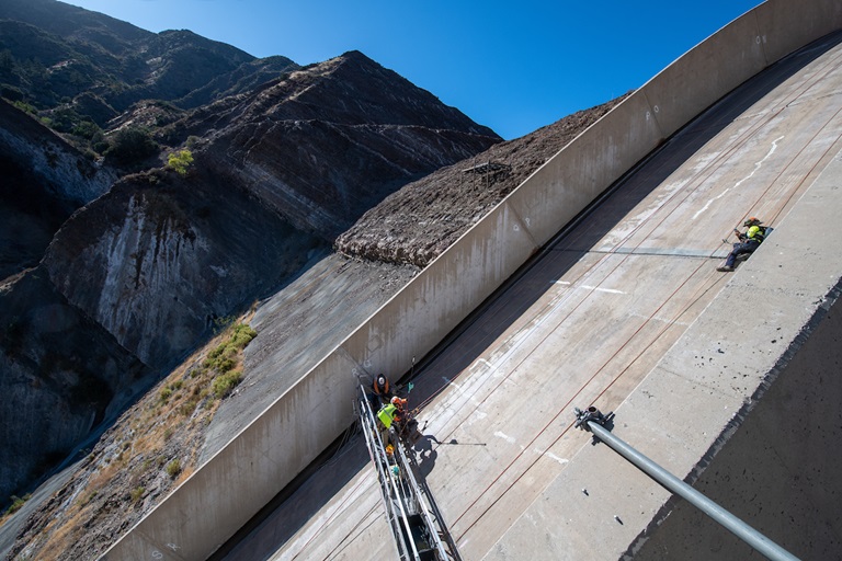 Crews install piezometers on the gated spilway for the Pyramid Dam Modernization project in Los Angeles County, California. 