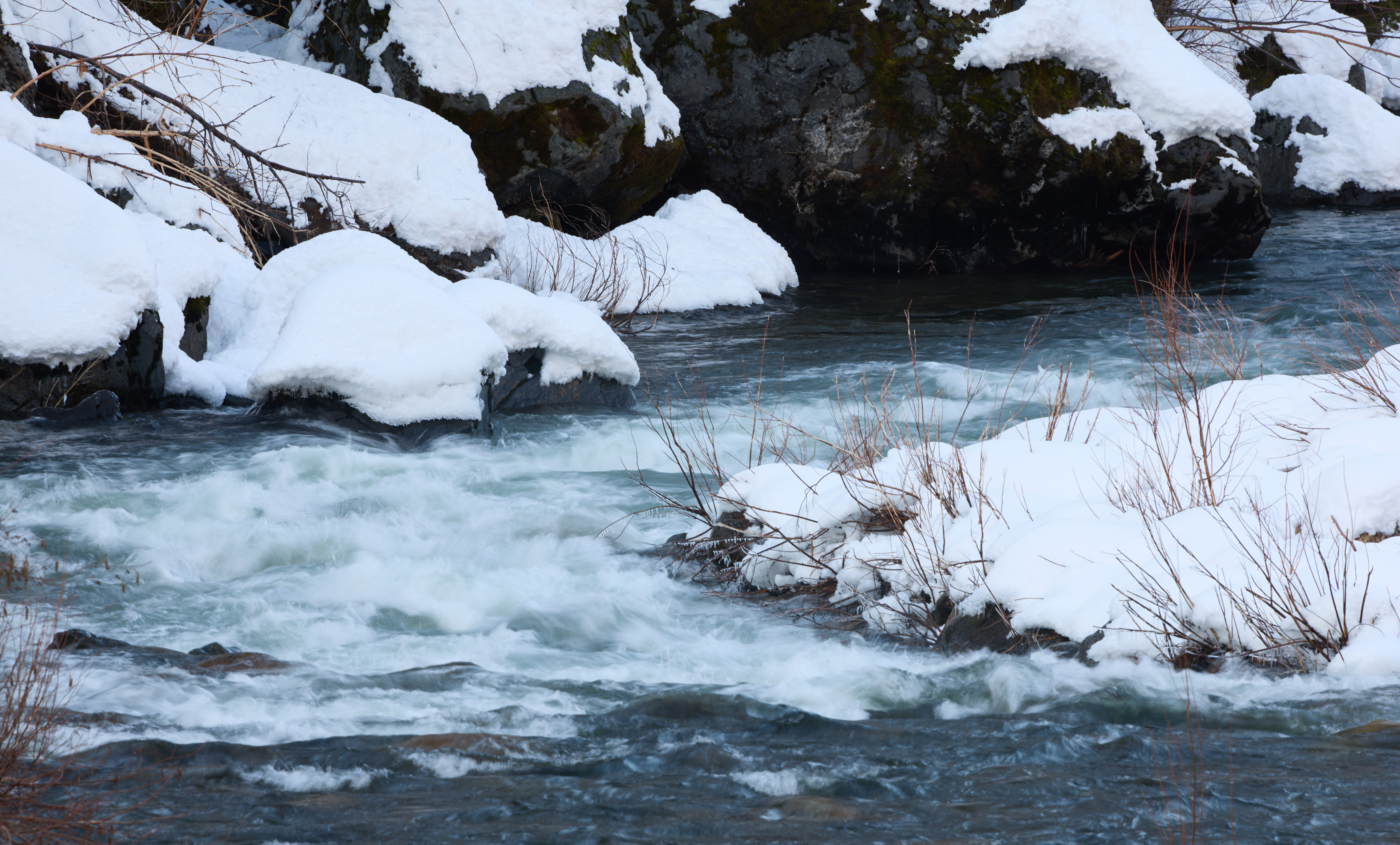 Snow melts into the South Fork of the American River located near White Hall along Highway 50 in El Dorado County.