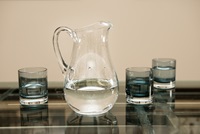 image of pitcher of water and glasses
