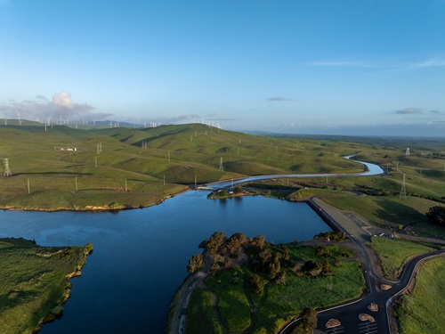 A drone view of the Bethany Reservoir, impounded by five dams in Alameda County, serves as a forebay for the South Bay Pumping Plant and afterbay for Banks Pumping Plant. Photo taken March 28, 2024.