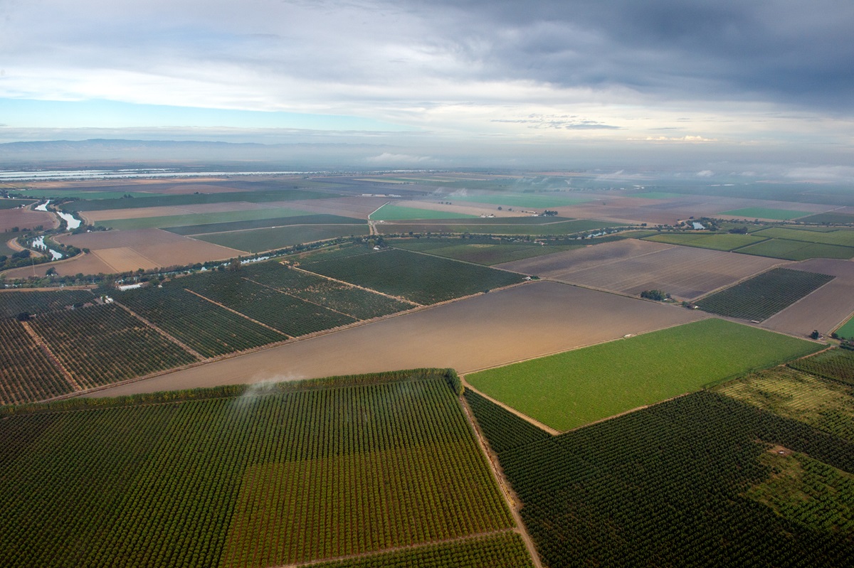 Aerial view of farmland and waterways in the Sacramento Valley in Northern California.