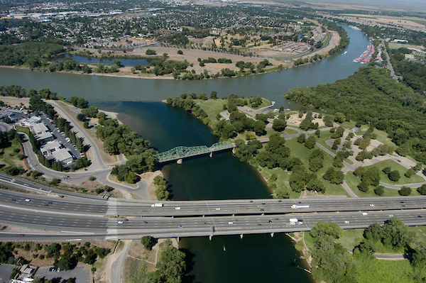 Photo of the confluence of the Sacramento River (top) and the American River (bottom), north of Sacramento, California 