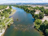 An aerial view of high water conditions at the Feather River near Feather River Bridge along Highway 162 in Oroville, California, located in Butte County. Photo taken June 20, 2023.