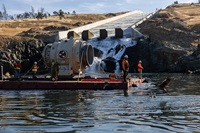 Large valves are transported on a barge up the Diversion Pool to Oroville Dam. California Department of Water Resources is updating Oroville Dam’s River Valve Outlet System (RVOS) to ensure the ability to discharge cold water to the Feather River to maintain water temperatures necessary for fish health, especially during periods of drought. Photo taken May 29, 2025.