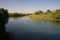 The Yuba River flows east to west from the Sierra Nevada Mountains into the Sacramento Valley in Northern California.