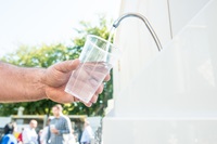 image of drinking water from a tap